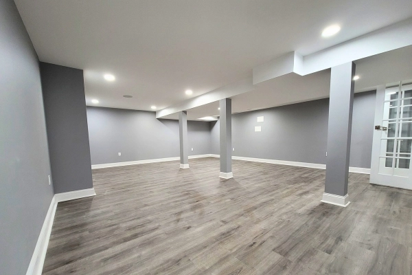 Basement finishing princeton with gray walls and vinyl flooring by lee home remodel